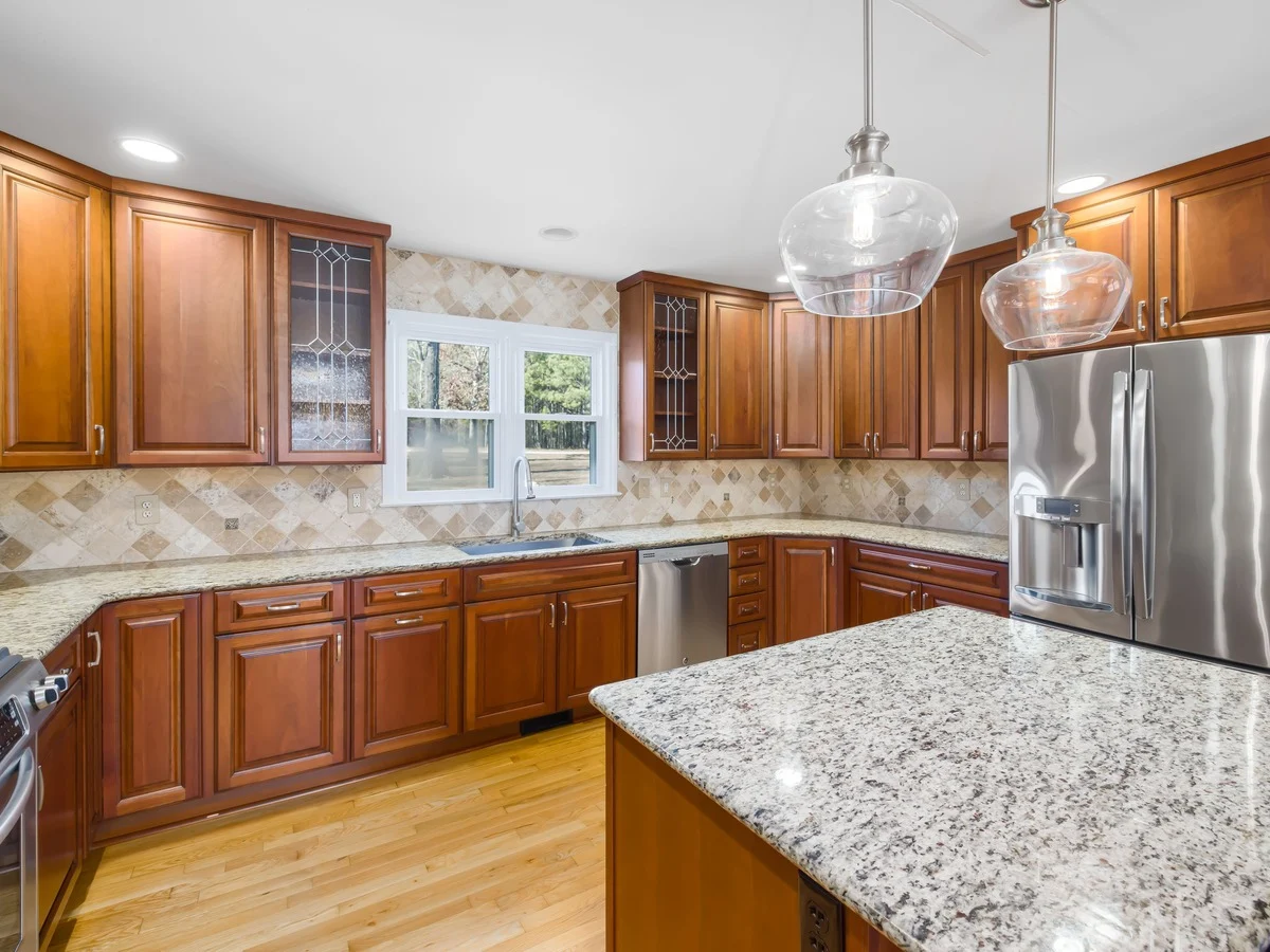 Original transitional kitchen with wood cabinets before AI redesign